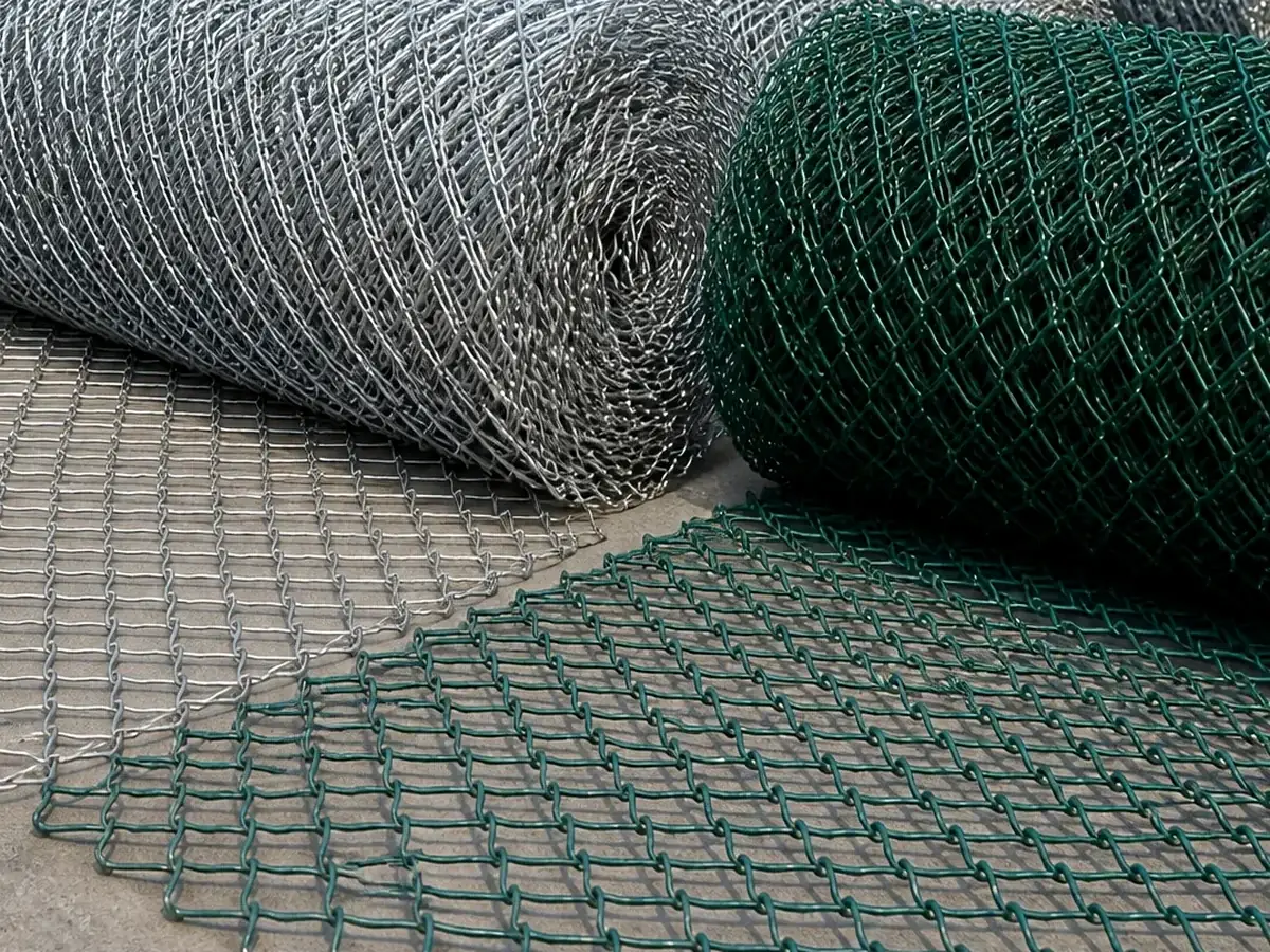 close-up of galvanized chain link fence mesh and post detail