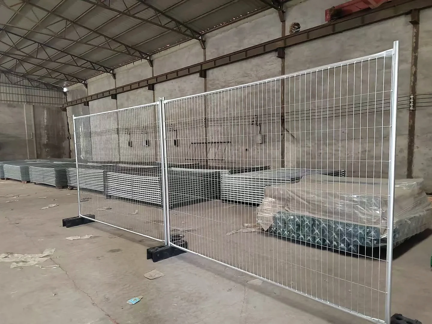 complete galvanized temporary fence panels standing in portable feet
