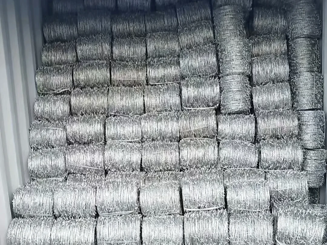 wrapped hexagonal wire netting rolls stacked inside an open container